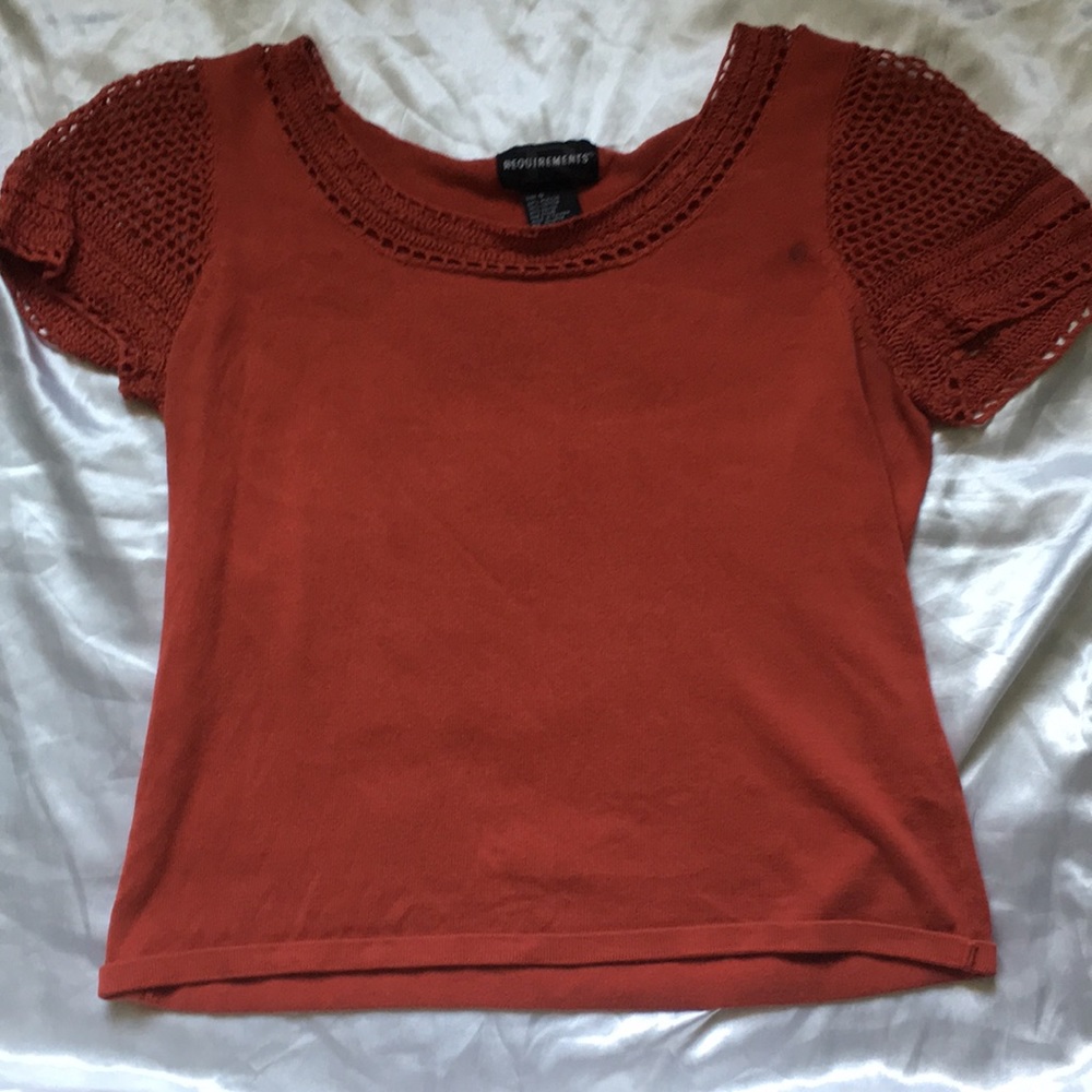 Knitted burn orange crop top shirt.